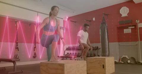 Image of data processing over diverse man and woman exercising in gym Stock Photos
