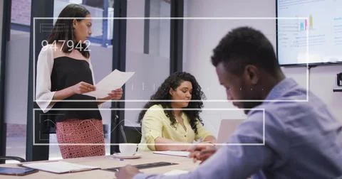 Image of data processing over diverse business people in office 写真素材