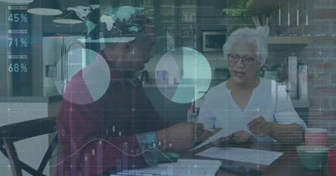 Image of data processing over diverse senior couple holding documents Stock Photos