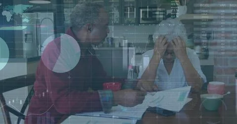 Image of data processing over diverse senior couple holding documents 库存照片