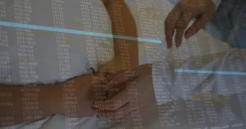 Image of data processing over diverse doctor and patient holding hands in Stock Photos