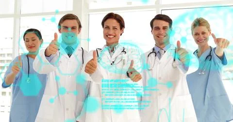 Image of data processing over diverse doctors with thumbs up Stock Photos
