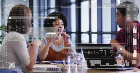 Image of data processing over diverse colleagues discussing work in office Stockfoto's