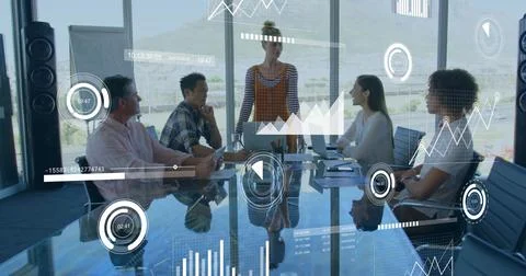 Image of data processing over diverse colleagues having meeting in office Stockfoto's