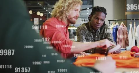 Image of data processing over diverse colleagues discussing work in office Stockfoto's