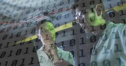 Image of data processing over diverse workers in server room 写真素材