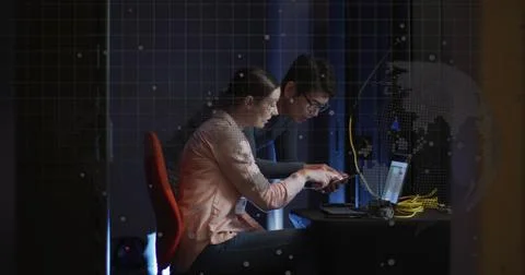 Image of data processing over diverse workers in server room Stockfoto's