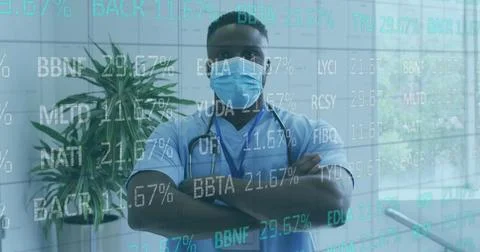 Image of data processing over diverse male doctor Stock Photos