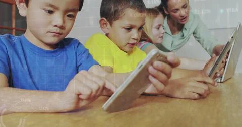 Image of data processing over diverse schoolchildren and teacher using tablet Foto stock