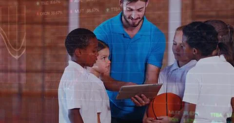 Image of data processing over diverse schoolchildren and teacher using tablet Foto stock