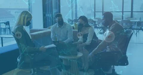 Image of data processing over diverse business people with face masks talking in Foto stock