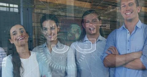 Image of data processing over diverse business people smiling Foto stock