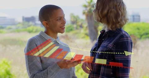 Image of data processing over diverse business people using smartphone Stock Photos