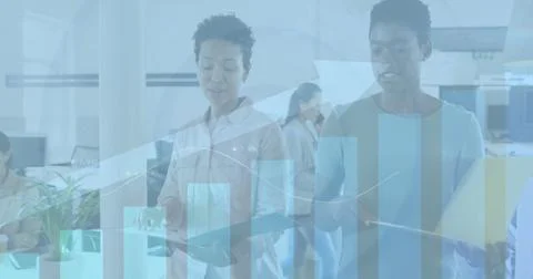 Image of data processing over diverse business people talking in office Stock Photos