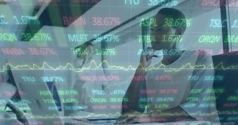 Image of data processing over diverse business people in office Stock Photos