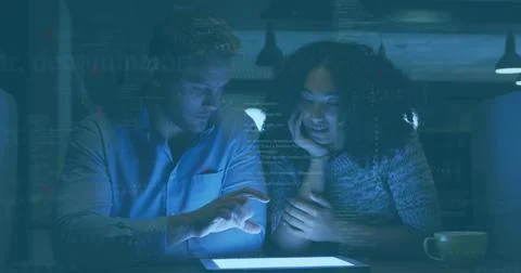 Image of data processing over diverse business people using tablet in office Stock Photos