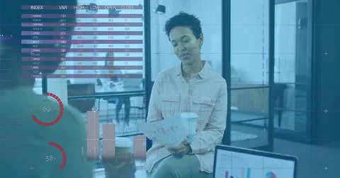 Image of data processing over diverse business people talking in office Stock Photos