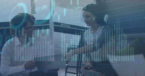Image of data processing over diverse business people talking in office Stock Photos