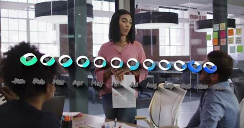 Image of data processing over diverse business people at meeting Stock Photos