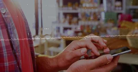 Image of data processing over hands using smartphone Stock Photos