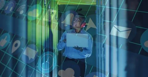 Image of data processing over male african american server room worker using Stockfoto's