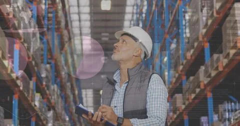Image of data processing over man working in warehouse Foto stock