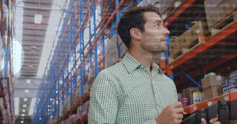 Image of data processing over man working in warehouse Foto stock