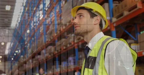 Image of data processing over man working in warehouse Foto stock