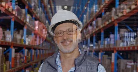 Image of data processing over man working in warehouse Foto stock