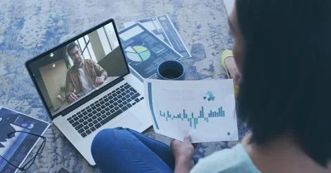 Image of data processing over rear view of woman holding a document having a Stock Photos
