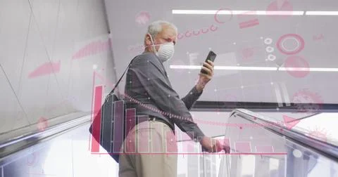Image of data processing over senior man wearing face mask 스톡 사진
