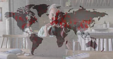 Image of data processing over senior biracial man using laptop Stock Photos