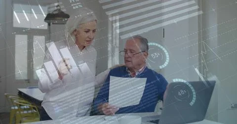 Image of data processing over senior caucasian couple using laptop Stock Photos