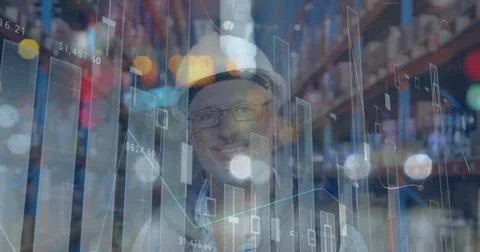 Image of data processing over smiling man working in warehouse shipping centr 库存照片