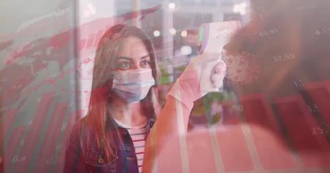 Image of data processing over two caucasian women taking temperature and wearing Stockfoto's