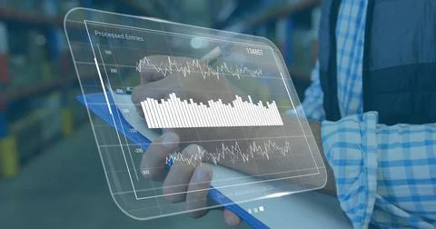 Image of data processing on screen over caucasian man working in warehouse Foto stock