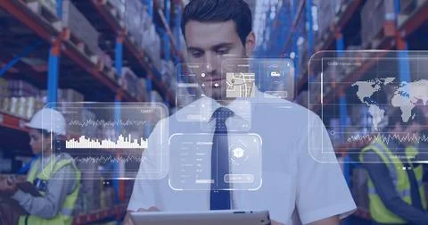 Image of data processing on screens over caucasian man working in warehouse Foto stock