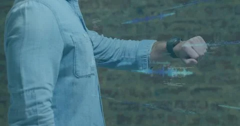 Image of data processing on screens over caucasian man checking smartwatch Foto stock