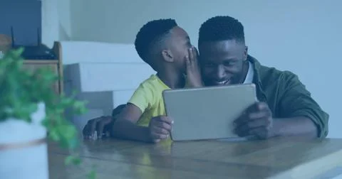Image of data on screens over happy african american father and son using tablet Stock Illustration