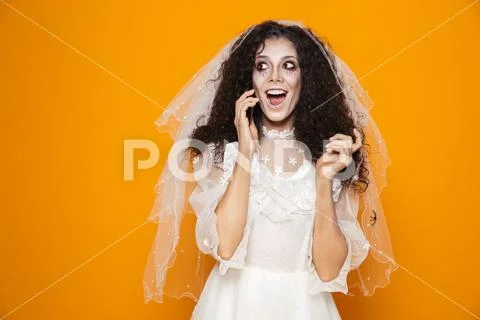 Image of dead bride zombie on halloween wearing wedding dress and scary makeu Stock Photos