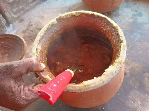 Image of delicious mutton cooked in an earthen pot Stock Photos