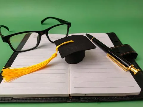 The image depicts items commonly associated with education and academia, su.. Stock Photos