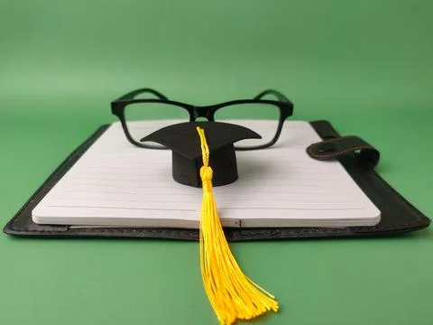 The image depicts items commonly associated with education and academia, su.. Stock Photos