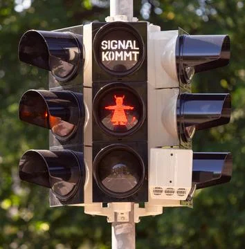 Image of a devil on a broomstick at a traffic light in Wernigerode. Germany. Stock Photos