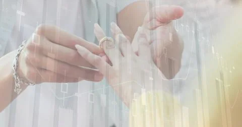 Image of diagrams and data processing over biracial man putting ring on hand of Stock Photos