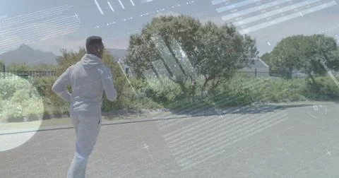 Image of diagrams and data processing over african american man running in park Stock Photos