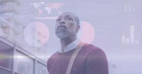 Image of diagrams and data processing over african american man walking in city Stockfoto's