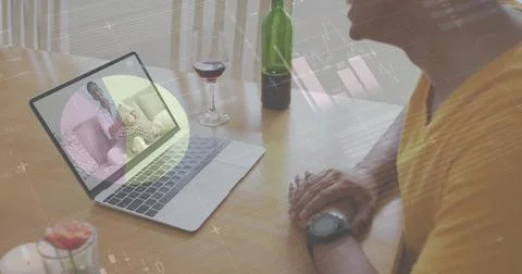Image of diagrams and data processing over biracial man having image call with Stock Photos