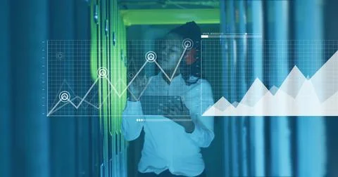 Image of diagrams and data processing over biracial female worker in server room Foto stock