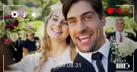 Image of digital camera interface over caucasian married couple smiling to Stock Photos